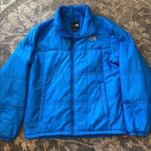 Blue north face puffer jacket